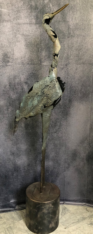 Abstract bronze sculpture of heron