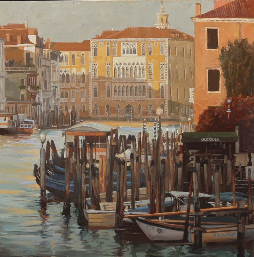 Gondola harbor with buildings in background