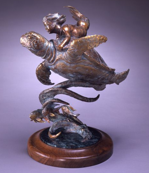 Bronze sculpture of merbaby riding sea turtle