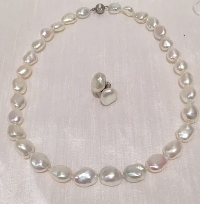 Fresh water pearl necklace with matching earrings
