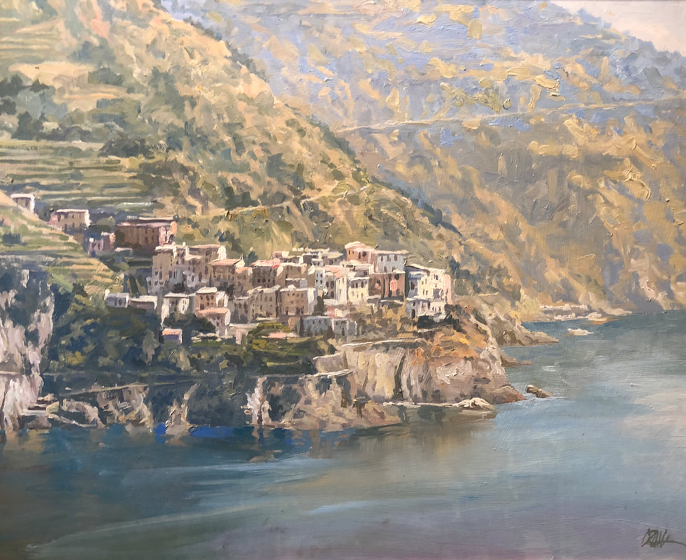 Landscape of Ligurian coast with buildings on cliff above ocean