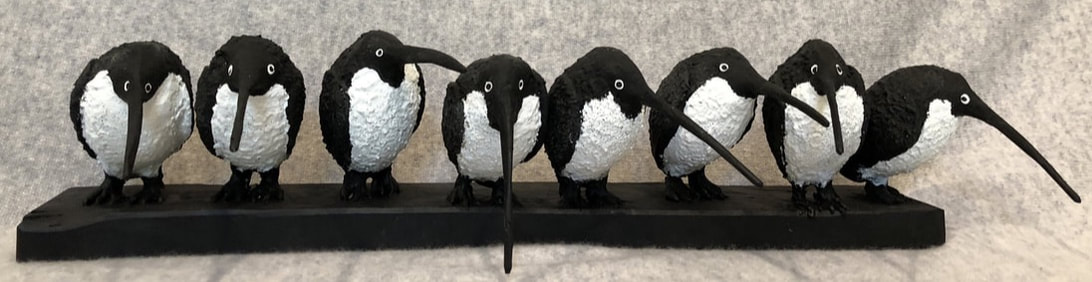 Abstract sculpture of penguins