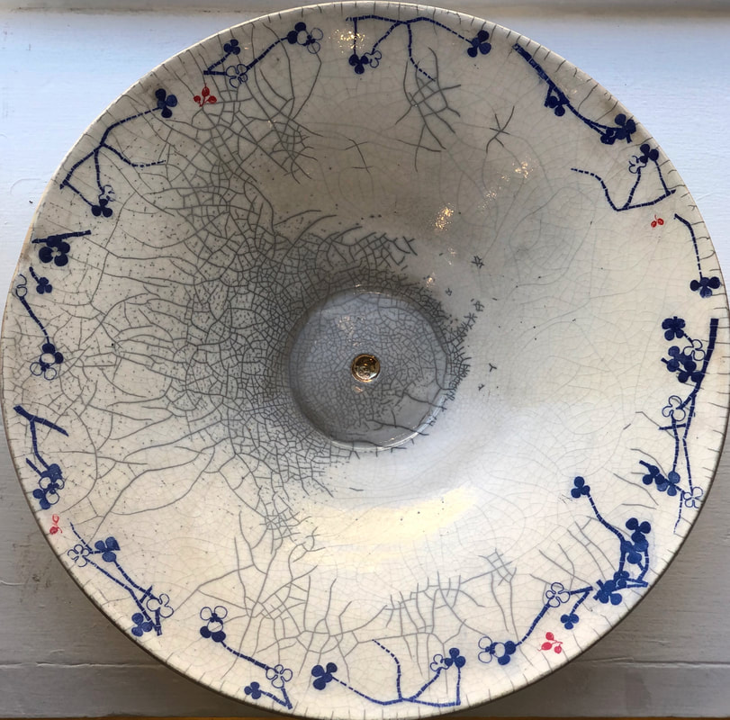 Large raku fired and painted ceramic platter