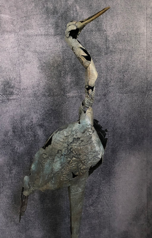 Abstract bronze sculpture of heron