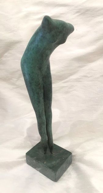 Abstract bronze sculpture of human body