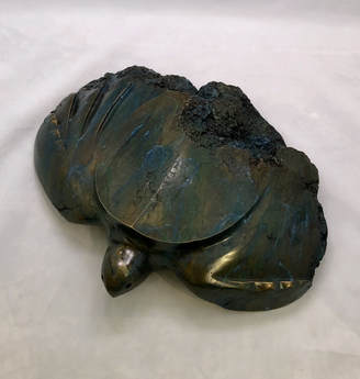 Top of bronze sculpture of sea turtle