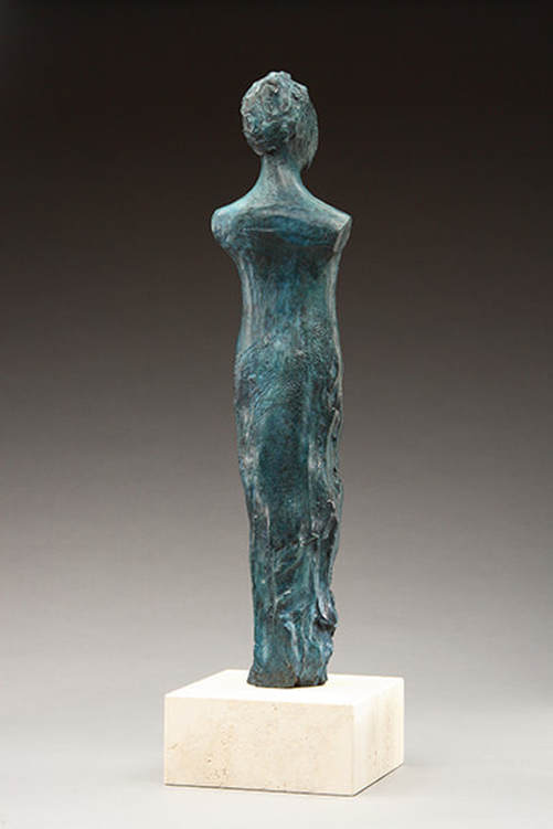 Abstract bronze sculpture of female body