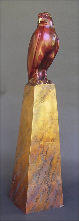 Bronze sculpture of falcon on pedestal