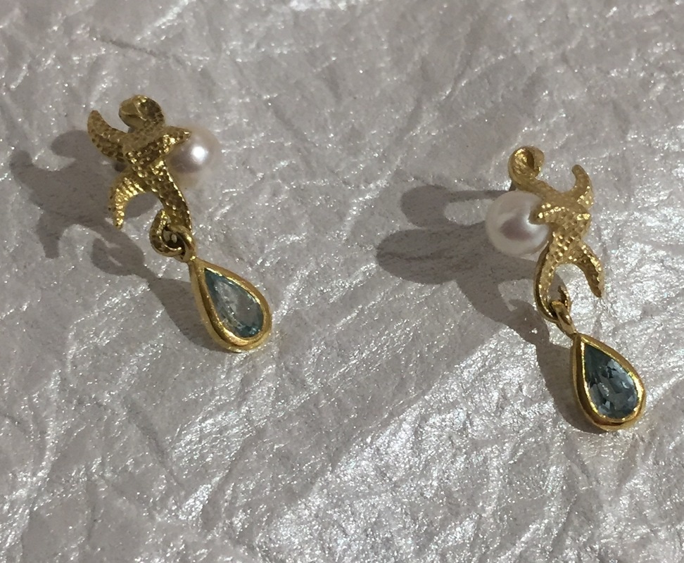 Pair of earrings with pearl and gemstones