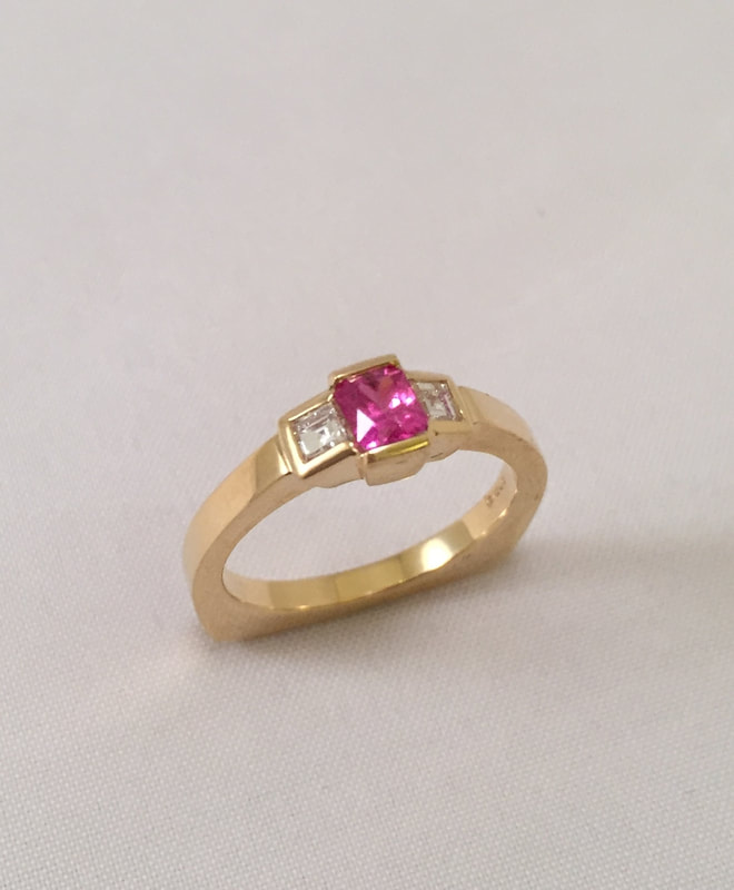 Gold ring with gemstones