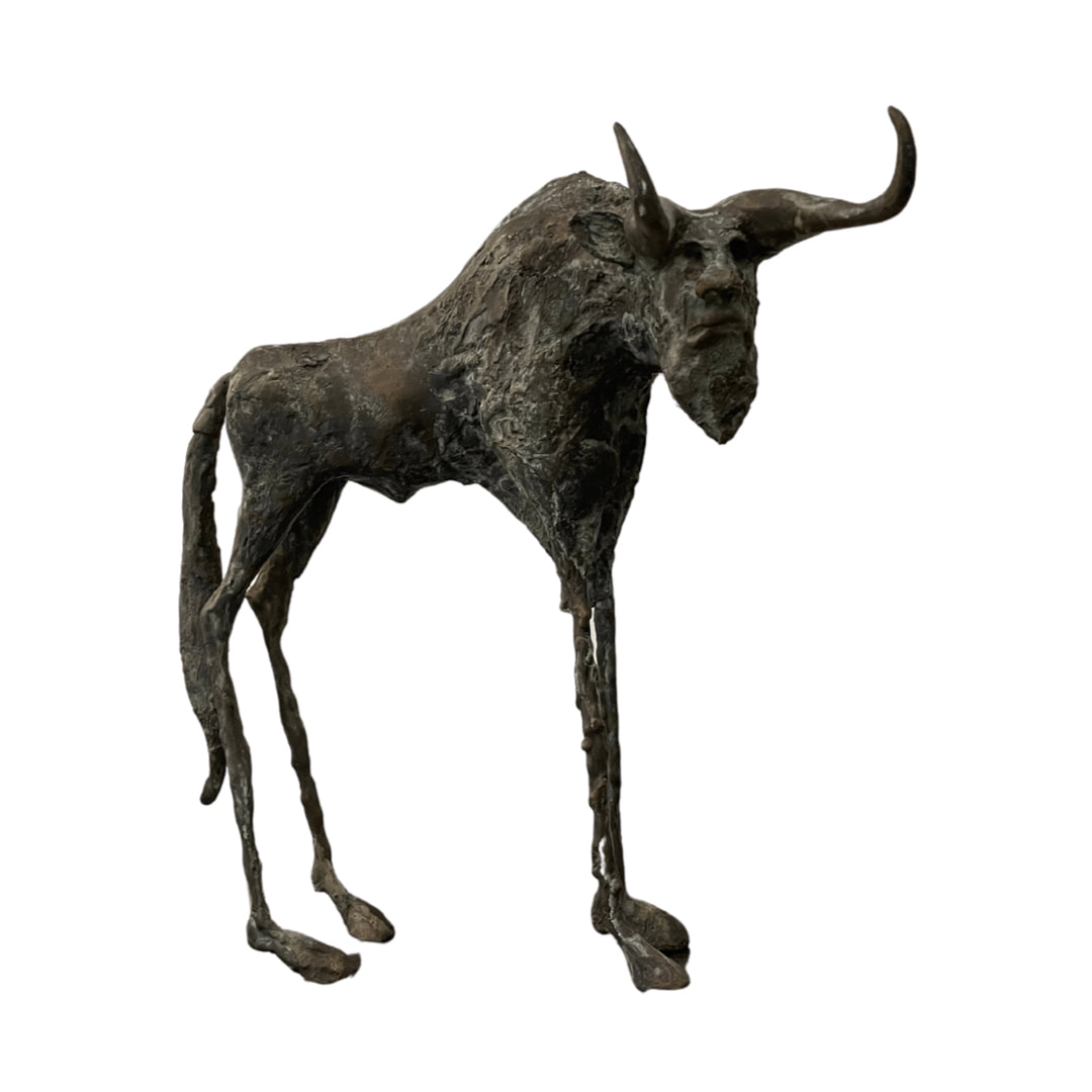Profile view abstract bronze wildebeest sculpture 