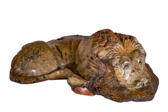 bronze casting of a wood burl lion