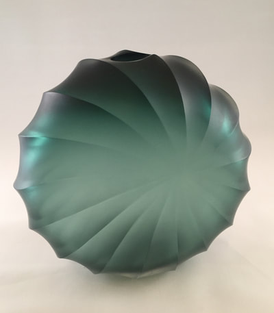 Steely green round glass vessel
