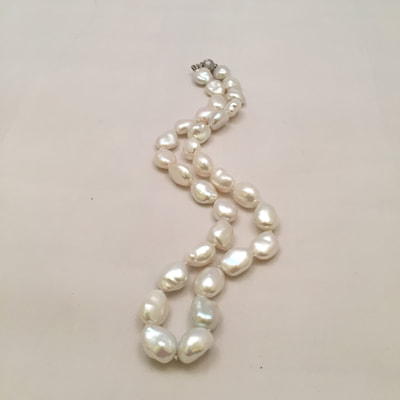 Single strand of white freshwater pearl necklace