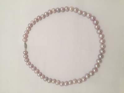 Single strand of pink pearls