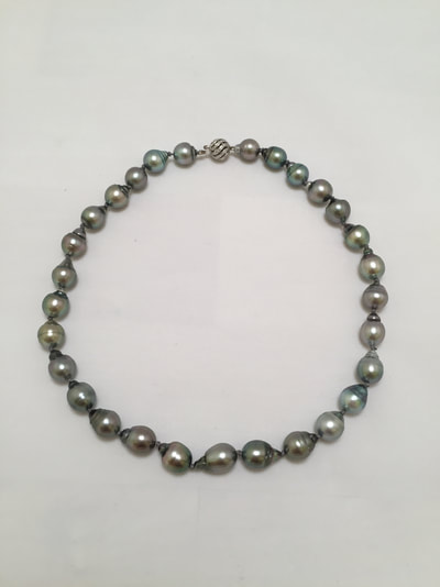 Single strand of black pearls